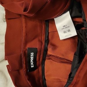 High waist burnt orange pants with belt and pockets